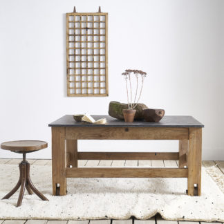 Ancient workshop table with blue stone.