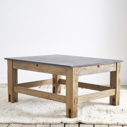 Ancient workshop table with blue stone.