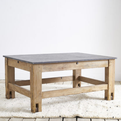 Ancient workshop table with blue stone.