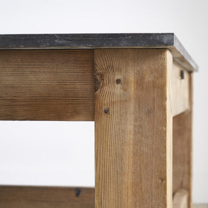 Ancient workshop table with blue stone.