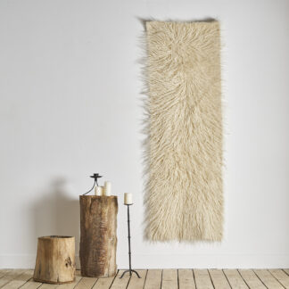 Ouvrage textile 100% laine de mouton, tissé à la main. tapis