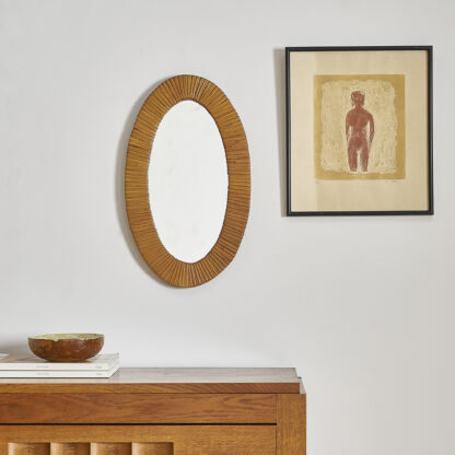 Joli petit miroir ovale en rotin