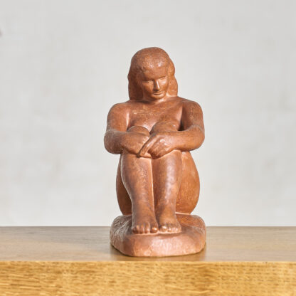 Femme nu assise