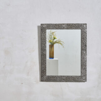 Miroir en métal texturé