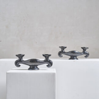 Paire de bougeoirs en céramique